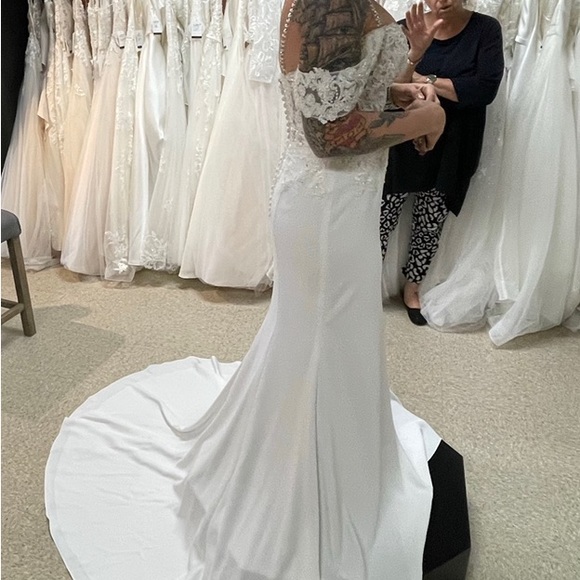 BRAND NEW - Beautiful, multiple ways to wear this wedding dress! - Picture 7 of 9